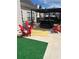 Backyard with a hot tub, outdoor seating, and a patio area, perfect for entertaining at 7881 Chadwick Ln, Riverdale, GA 30274