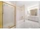 Spacious bathroom with glass shower, soaking tub, double vanity and natural light at 1330 Badingham Dr, Cumming, GA 30041