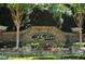 Stone community sign for Longlake with manicured landscaping at 1330 Badingham Dr, Cumming, GA 30041