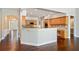 Bright kitchen with stainless appliances and eat-in breakfast bar visible from entryway at 1330 Badingham Dr, Cumming, GA 30041