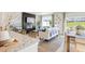 Bright, airy living space showcasing modern fireplace, and comfortable seating at 1028 Sutherland Lane (Lot 45), Lawrenceville, GA 30043