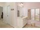 Bathroom featuring vanity with a modern vessel sink and three-paneled medicine cabinet at 4557 Waldens Farm Ct, Powder Springs, GA 30127