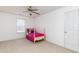 Cozy bedroom featuring a charming bed and ample natural light at 4557 Waldens Farm Ct, Powder Springs, GA 30127