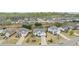 Wide aerial view of a residential neighborhood showcasing well-maintained homes and lawns at 6060 Country Lake Rd, Cumming, GA 30041