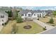Aerial view of the property showcasing the landscaped front yard and surrounding neighborhood at 6060 Country Lake Rd, Cumming, GA 30041