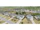 Aerial shot of a quiet neighborhood featuring well-kept lawns and diverse home styles at 6060 Country Lake Rd, Cumming, GA 30041
