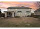 Spacious backyard featuring a covered patio area, perfect for outdoor entertaining and relaxation at 6060 Country Lake Rd, Cumming, GA 30041