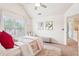 Bright bedroom featuring white walls, large window and area rug at 6060 Country Lake Rd, Cumming, GA 30041