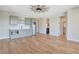 Bonus room with wet bar including undermount microwave, stainless fridge, and granite countertops at 1130 Lupo Loop, Chattahoochee Hills, GA 30268
