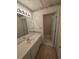 Bathroom featuring a vanity with a mirror, toilet, and shower at 2012 Grove Park Ct, Marietta, GA 30062