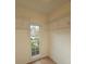Spacious walk-in closet with white wire shelving and a window for natural light at 2012 Grove Park Ct, Marietta, GA 30062