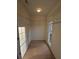 Walk-in closet featuring white wire shelving, a window, and ample storage space at 2012 Grove Park Ct, Marietta, GA 30062