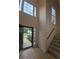 Bright foyer with soaring ceilings, lots of windows and a staircase leading to the upper level at 2012 Grove Park Ct, Marietta, GA 30062