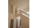 Bright foyer area with high ceilings and a staircase with wood railing at 2012 Grove Park Ct, Marietta, GA 30062