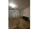 Uncluttered garage with overhead door, concrete floors, and ample storage space at 2012 Grove Park Ct, Marietta, GA 30062