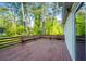Expansive wooden deck with built-in seating, perfect for outdoor relaxation and entertaining at 4166 Rue Saint Michel, Stone Mountain, GA 30083