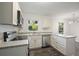 Well-appointed kitchen features modern appliances, lots of counter space, and great light at 4166 Rue Saint Michel, Stone Mountain, GA 30083