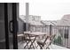 Cozy outdoor balcony with chairs and table offering an excellent place to relax and enjoy the view at 600 Broadview Ne Ter, Atlanta, GA 30324