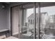 Outdoor patio with a table, chairs, and sliding glass doors that offer community views at 600 Broadview Ne Ter, Atlanta, GA 30324