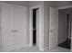 Neutral bedroom with double closet doors and open door leading to bathroom at 600 Broadview Ne Ter, Atlanta, GA 30324