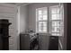 Convenient laundry room with modern washer and dryer, and a window for natural light at 600 Broadview Ne Ter, Atlanta, GA 30324