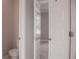 Enclosed toilet room viewed from carpeted bedroom at 600 Broadview Ne Ter, Atlanta, GA 30324