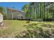 Well-maintained backyard with a deck, offering privacy and outdoor enjoyment at 3076 Nectar Dr, Powder Springs, GA 30127