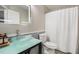Updated bathroom featuring a unique glass vessel sink and modern fixtures at 3076 Nectar Dr, Powder Springs, GA 30127