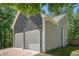 Spacious two-car garage offers plenty of parking and storage space at 3076 Nectar Dr, Powder Springs, GA 30127