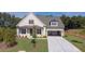 Charming single-Gathering home with a well-manicured lawn and a two-car garage in a quiet neighborhood at 5385 Keepsake Court, Cumming, GA 30040