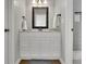 Modern bathroom with a stylish vanity and a tiled shower at 1021 Windy Oaks Se Ct, Smyrna, GA 30080