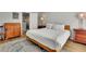 Spacious bedroom with hardwood floors and classic furnishings at 1021 Windy Oaks Se Ct, Smyrna, GA 30080