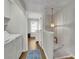 Hallway featuring the laundry with washer, dryer, and linen storage at 1021 Windy Oaks Se Ct, Smyrna, GA 30080