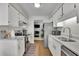 Bright kitchen with stainless steel appliances and white cabinets at 1021 Windy Oaks Se Ct, Smyrna, GA 30080