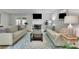 Spacious living room with a cozy fireplace, neutral paint, French doors, and stylish furniture at 1021 Windy Oaks Se Ct, Smyrna, GA 30080