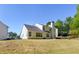 The backyard features a well-maintained lawn and a view of the back of the house at 2181 Poplar Grove Ct, Snellville, GA 30078
