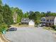 Charming two-story home with a welcoming front porch and manicured lawn on a cul-de-sac at 2181 Poplar Grove Ct, Snellville, GA 30078