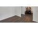 Open-concept living area showcasing elegant archways, hardwood floors, and seamless flow at 2181 Poplar Grove Ct, Snellville, GA 30078