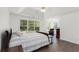 Spacious main bedroom features hardwood floors, large windows and tray ceilings at 2181 Poplar Grove Ct, Snellville, GA 30078
