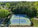 Aerial view of two fenced tennis courts; the Arborwood Swim and Racquet Club is visible above the net at 2181 Poplar Grove Ct, Snellville, GA 30078
