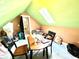 Charming attic featuring a sloped ceiling, natural light, with space for a table and chairs at 635 Sw Queen Sw St, Atlanta, GA 30310