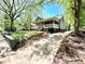 Quaint home with a welcoming front porch and well-maintained yard at 635 Sw Queen Sw St, Atlanta, GA 30310