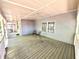 Expansive front porch offering an inviting outdoor seating area with a view of the surroundings at 635 Sw Queen Sw St, Atlanta, GA 30310