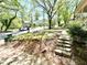 View of front yard featuring stone steps leading up to the home at 635 Sw Queen Sw St, Atlanta, GA 30310