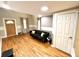 Interior view showing hardwood floors, natural light, and a modern couch at 635 Sw Queen Sw St, Atlanta, GA 30310
