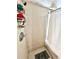 Tiled shower stall with a chrome shower head and built-in shelves at 635 Sw Queen Sw St, Atlanta, GA 30310