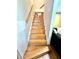 Wooden staircase leading to the upper level of the home at 635 Sw Queen Sw St, Atlanta, GA 30310