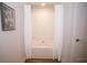 Bathroom showcasing a tub and shower combo with stylish white tile and framed wall art at 734 Great Oak Pl, Villa Rica, GA 30180