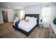 Inviting bedroom features a plush bed, bedside tables, and soft, natural light at 734 Great Oak Pl, Villa Rica, GA 30180