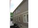 A house with a gray exterior has white windows and a neutral trim at 106 Hogue St, Atlanta, GA 30312